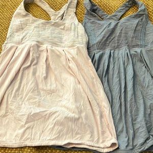 Two Lululemon pleated tank tops